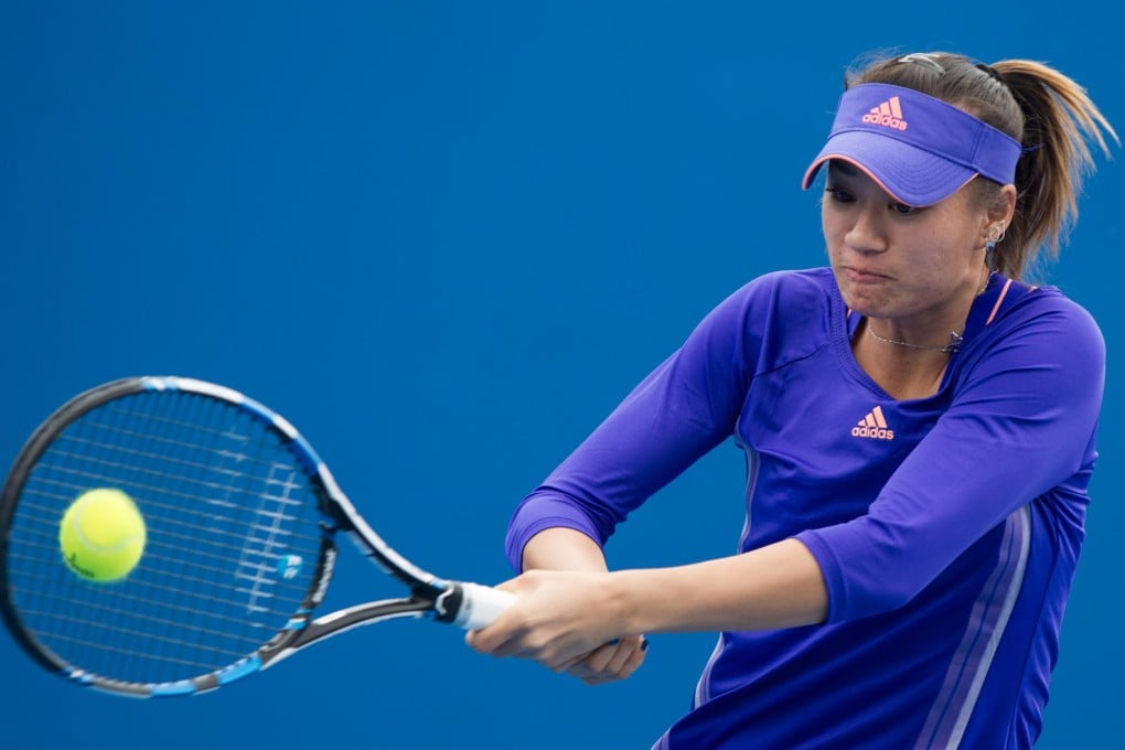 Xu Shilin of China returns the ball during the junior girls' singles second round match against Pranjala Yadlapalli of India at the Australian Open. Photos: Xinhua