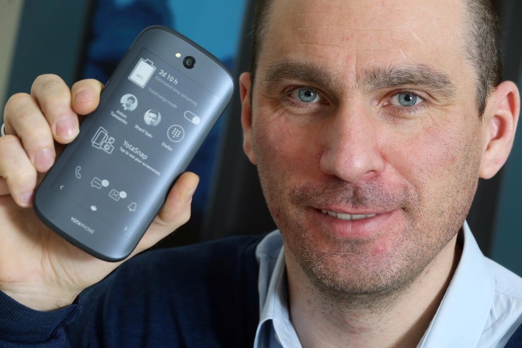 Vlad Martynov, CEO of Yota Devices, with the YotaPhone 2. Russian President Vladimir Putin gave two of the devices to President Xi Jinping as a gift. Photo: K.Y. Cheng