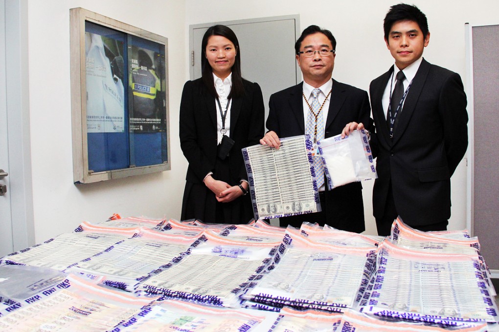 From left: Acting chief inspector Cheng Yan-yan, chief inspector Addy Li and senior inspector Kelvin Cheung Ka-wing show off the drug haul. Photo: SCMP