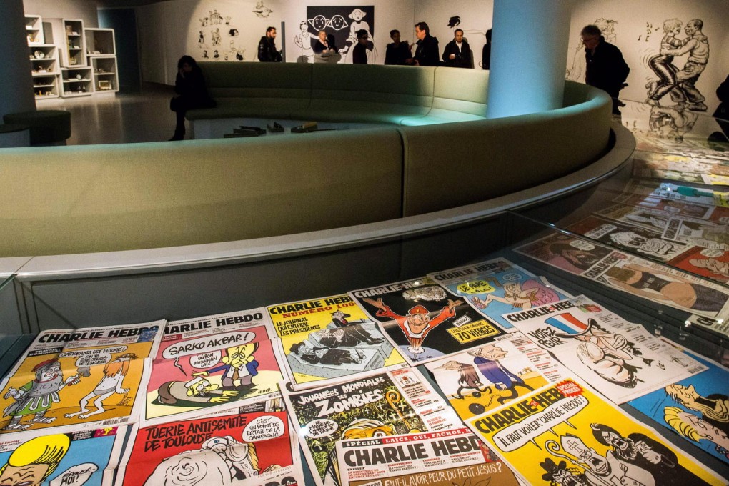 Issues of French satirical weekly Charlie Hebdo, 12 of whose artist were killed in a Paris attack, on display at the festival.Photo: AFP