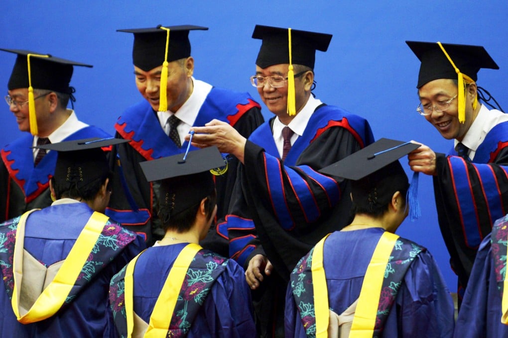 Educators turn the tassels for graduates at Zhejiang University. Chinese universities have been told to stop using books that inculcate Western ideology. Photo: Xinhua
