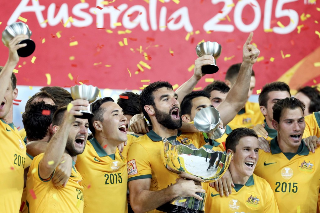Australia players celebrate after winning the Asian Cup final in Sydney. Photo: Reuters