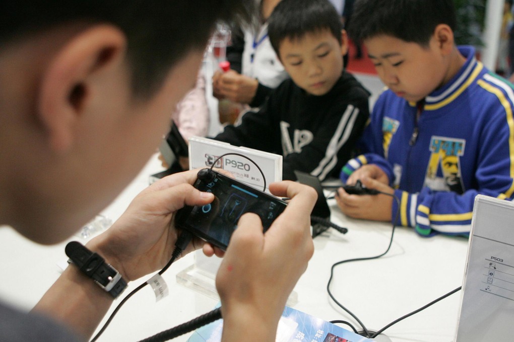 The number of users of mobile games on the mainland increased 15 per cent to 358 million in 2014, says the government. Photo: Imaginechina