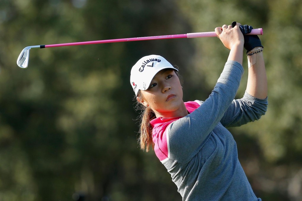 Lydia Ko watches her tee shot on the 15th hole at the Coates Golf Championship in Florida, where she missed out on first place but became the youngest-ever world No 1 at 17 years of age. Photo: AFP