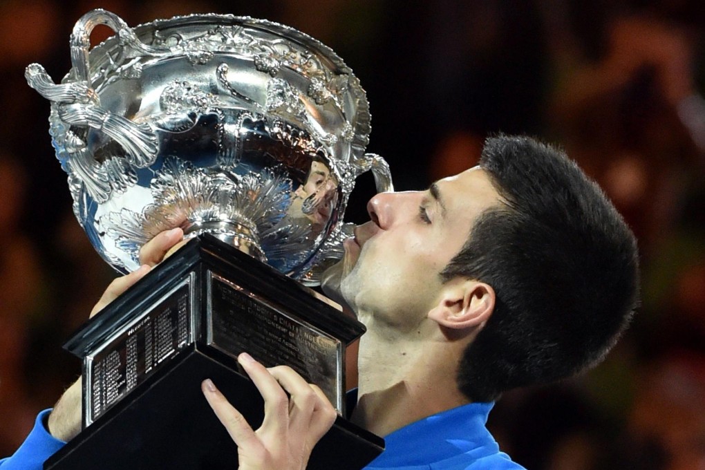 Novak Djokovic celebrates after victory in his men's singles final against Britain's Andy Murray at Melbourne Park. Photo: AFP