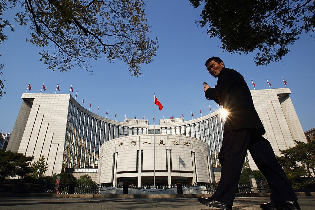 The People's Bank of China headquarters in Beijing. The cabinet and the country's fiscal authorities are trying to rein in debt and spending by local governments. Photo: Bloomberg