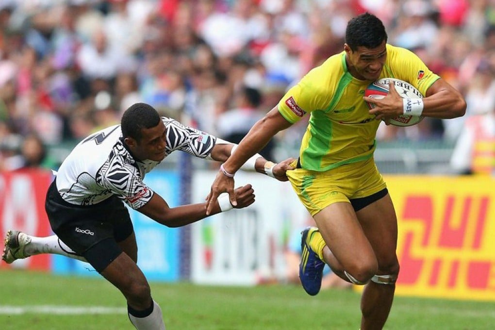 Australia's Pama Fou makes a break for the try-line against Fiji. Photo: World Rugby