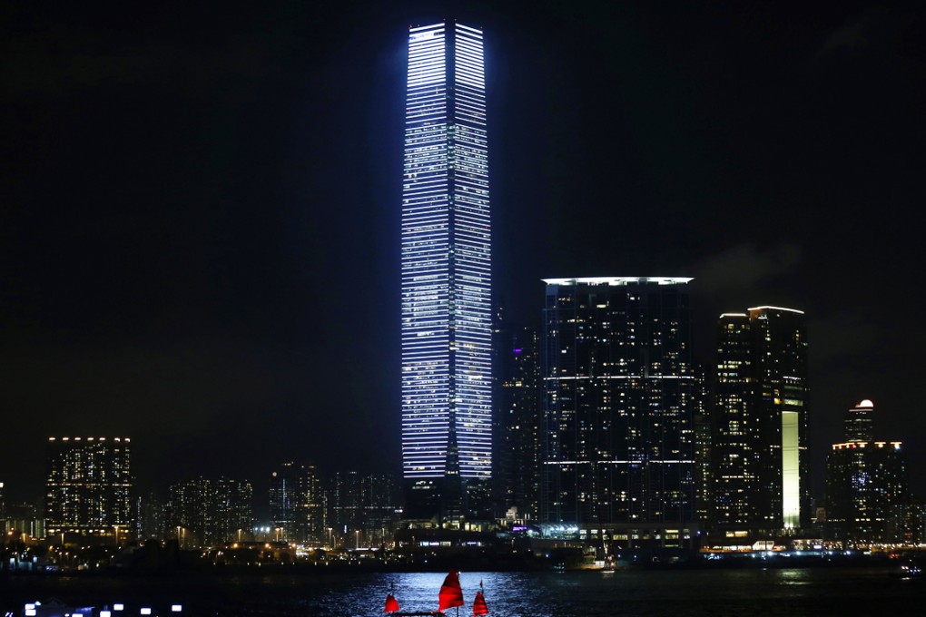 The city's tallest building, the International Commerce Centre, gleaming like a sharp knife blade over Victoria Harbour. Photo: Reuters