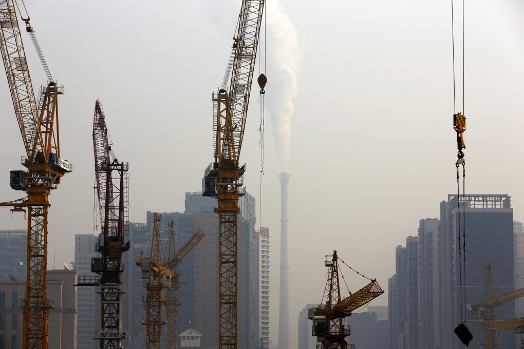 Smoke belches from a coal-fired power station in Beijing. China plans to launch a carbon market in 2016. Photo: AP