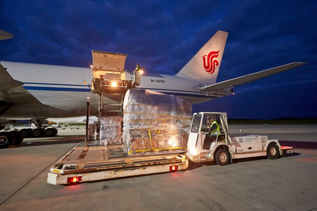 A Boeing 777 freight jet of Air China Cargo awaits loading in Europe. Photo: EPA