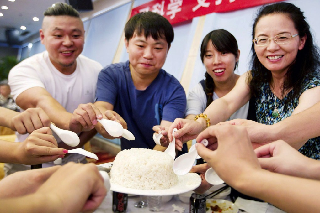 GM rice is put to a taste test in Beijing. Photo: Simon Song