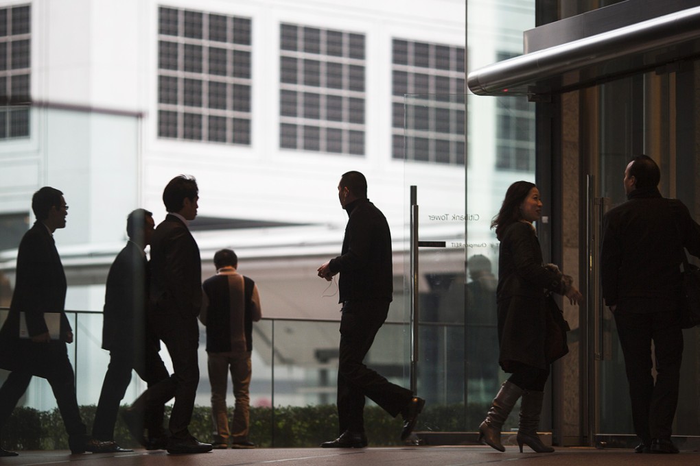 Hong Kong’s private sector is feeling the impact of the economic downturn across the border. Photo: Bloomberg