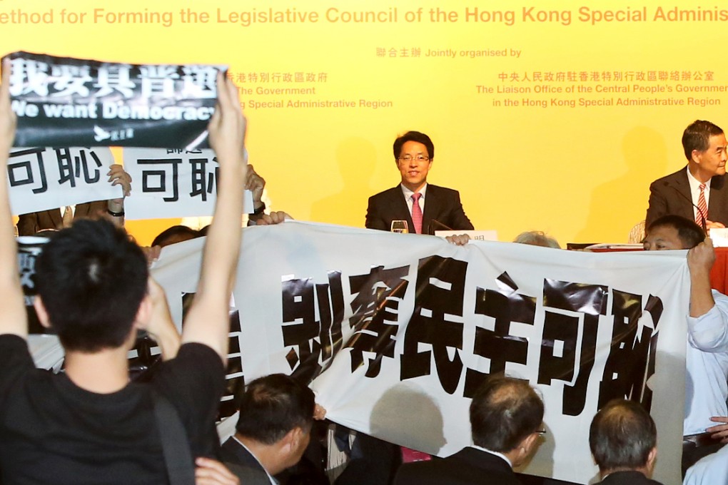 Central government's liaison office director Zhang Xiaoming hits out at democracy protests. Photo: Sam Tsang