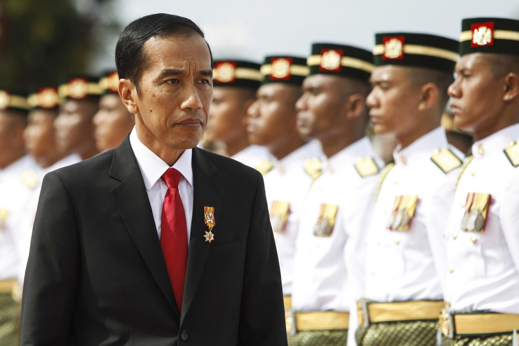 Joko Widodo is welcomed in Kuala Lumpur. Photo: AP