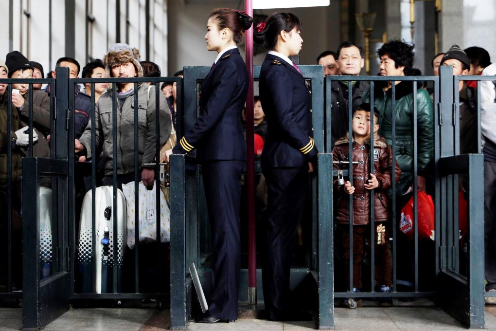 Passengers wait at Beijing Railway Station yesterday. The 40-day travel rush will last until March 16 and dozens of extra services will be laid on. Photo: Reuters