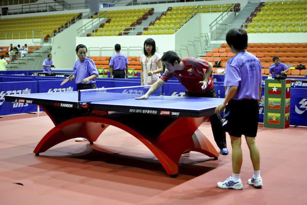 Myanmese table-tennis players undergo training ahead of the 2013 Southeast Asian Games.