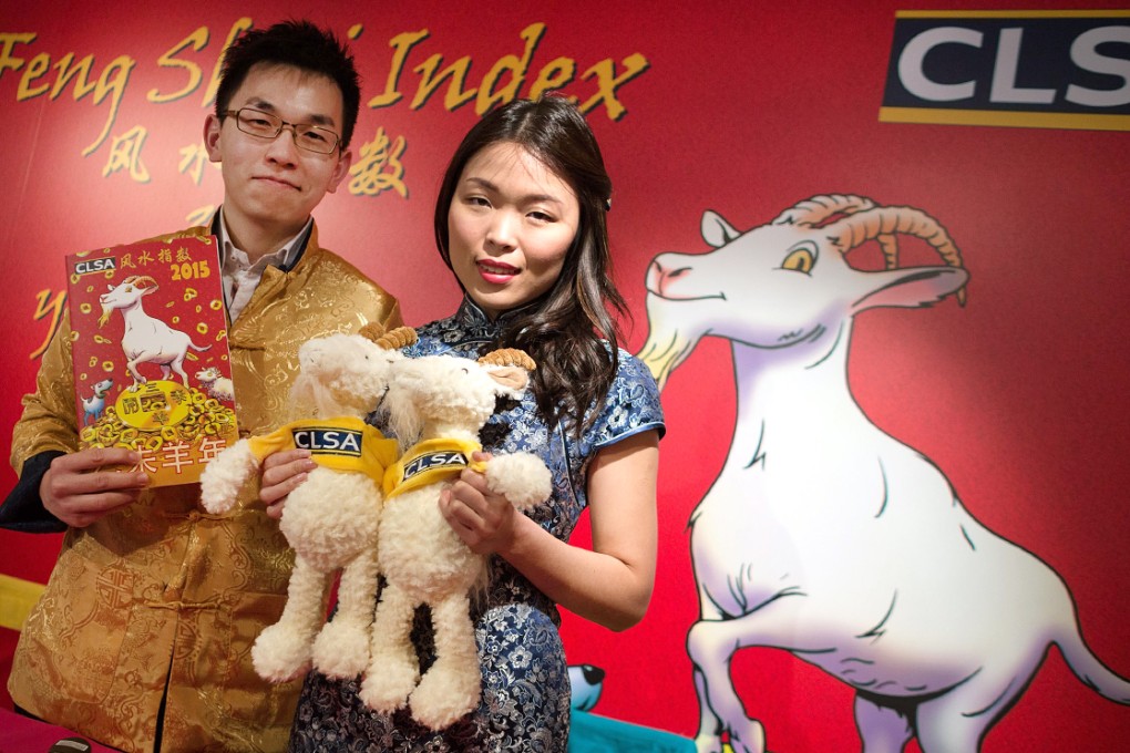 CLSA research associates Marco Yau and Cherry Ma. Photo: EPA