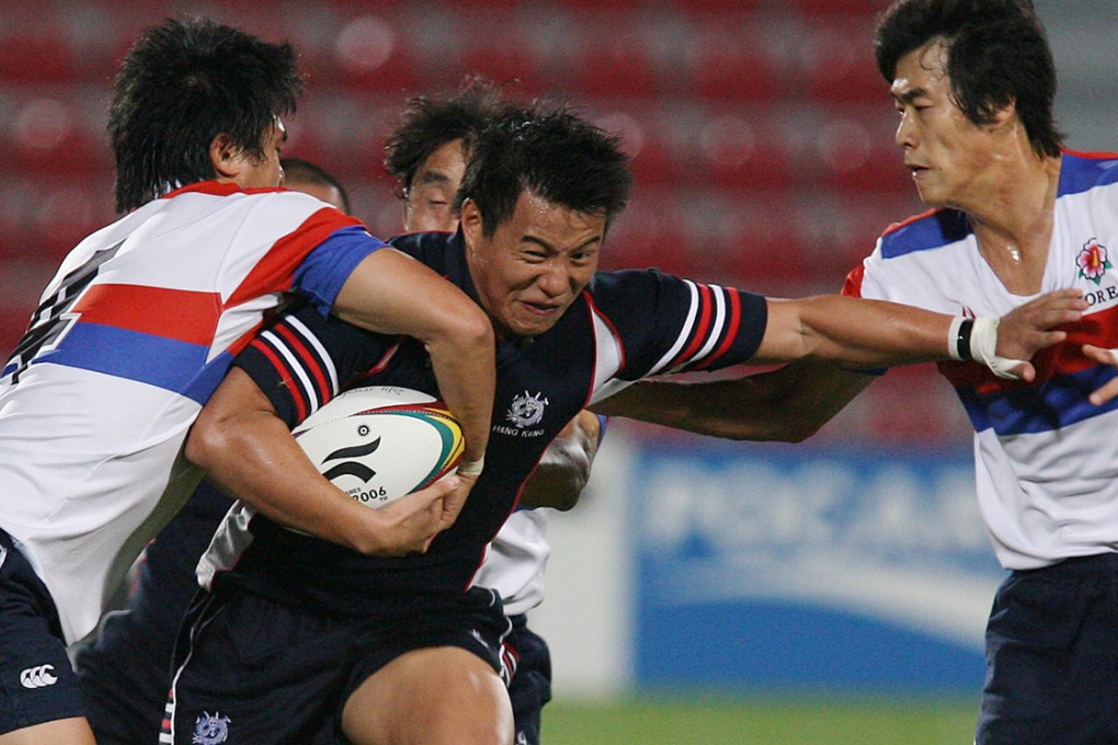 Ricky Cheuk Ming-yin, shown in action at the 2006 Asian Games in Doha, was the first local Chinese player to score a try at an RWC Sevens – a feat he achieved during the 2001 tournament. Photo: Felix Wong/SCMP