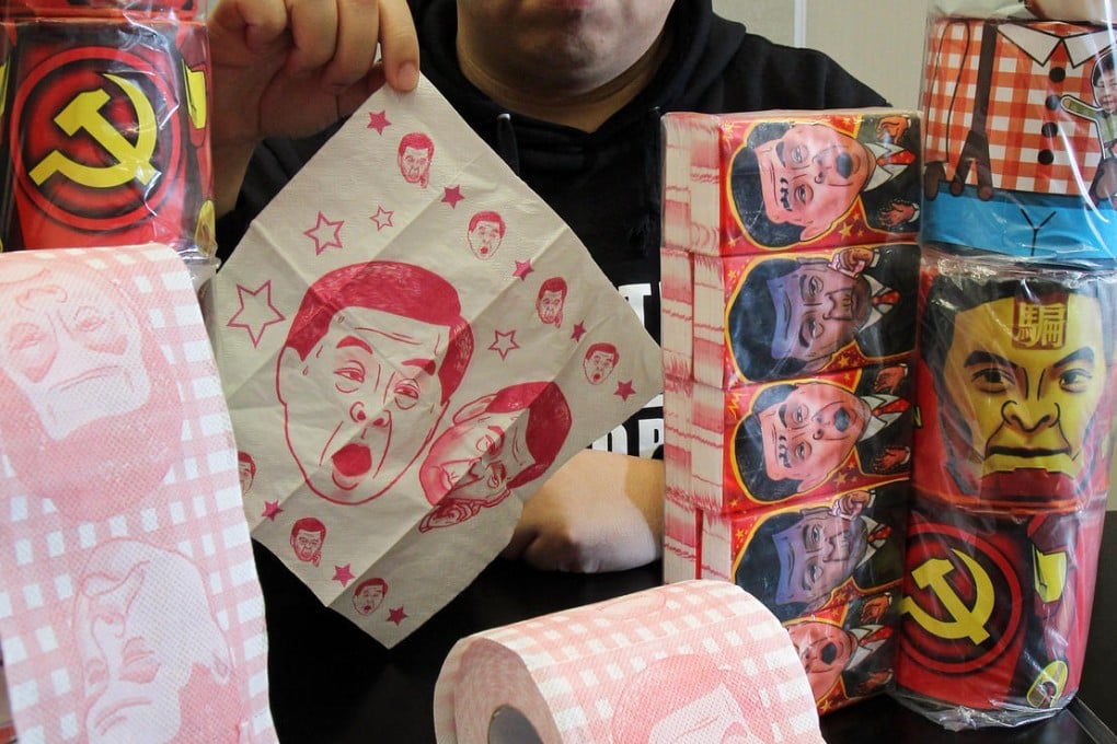 The Democratic Party's Kelvin Lai with the Leung Chun-ying toilet paper and tissues.Photo: Dickson Lee