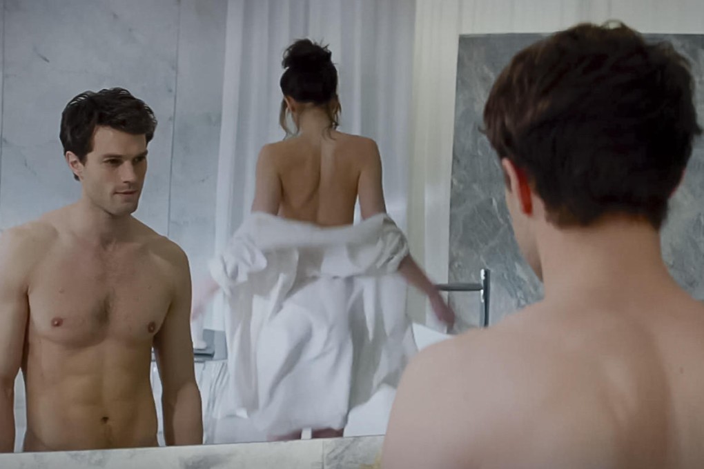 Dornan as Christian Grey in a scene with Dakota Johnson.