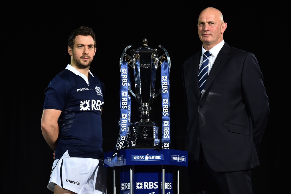 New Zealand-born coach Vern Cotter, pictured with captain Greig Laidlaw, brings new hope for Scotland going into their Six Nations opener against France. Photo: AFP
