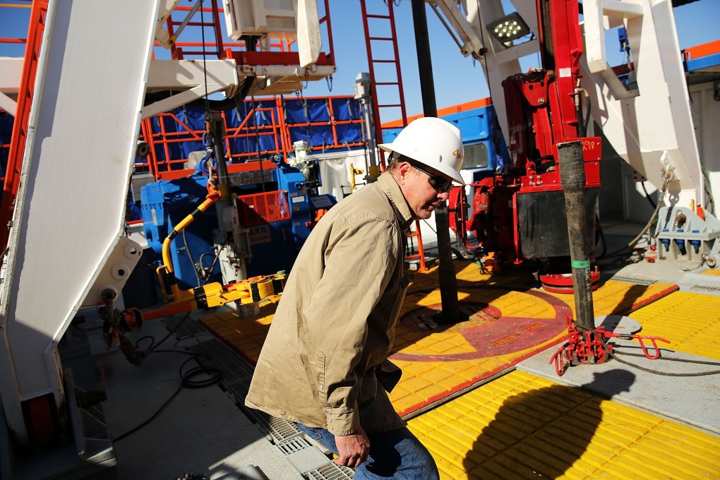 An American worker at a gas field in Texas. The number of US jobs went up 257,000 in January, the 11th straight month of job gains in the country. Photo: AFP