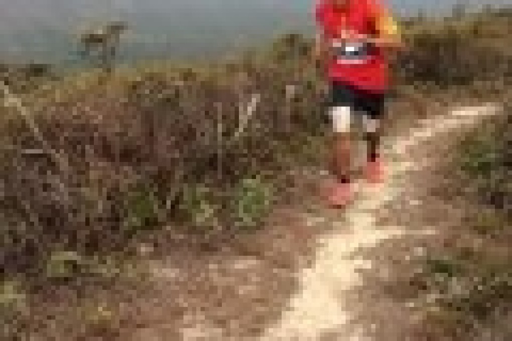 Samir Tamang on his way to victory in the50km MSIG Sai Kung 50 in four hours, 58 minutes and 40 seconds. Photo: SMP Pictures