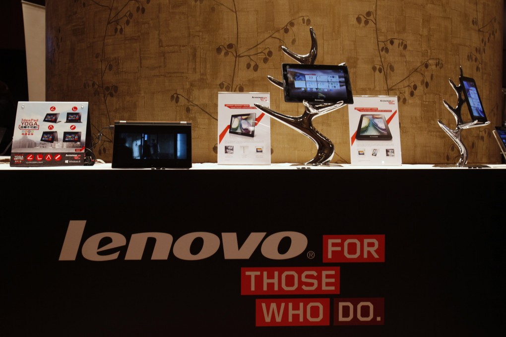 Lenovo tablets and mobile phones are displayed during a news conference in Hong Kong. Photo: Reuters