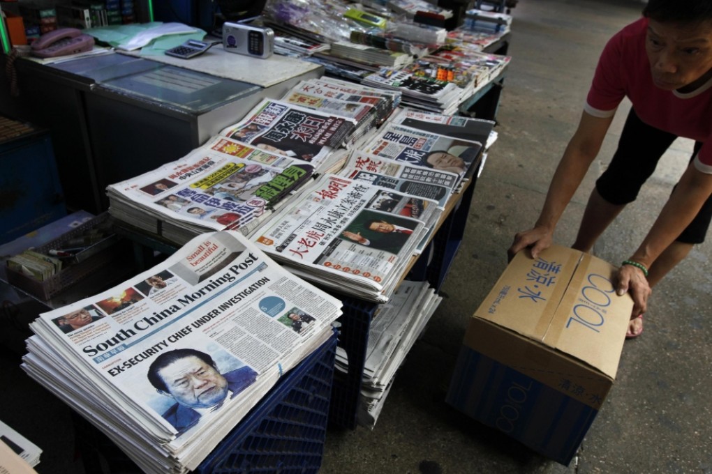 Hong Kong news stand showing a variety of both English and Chinese language dailies. Photo: Reuters