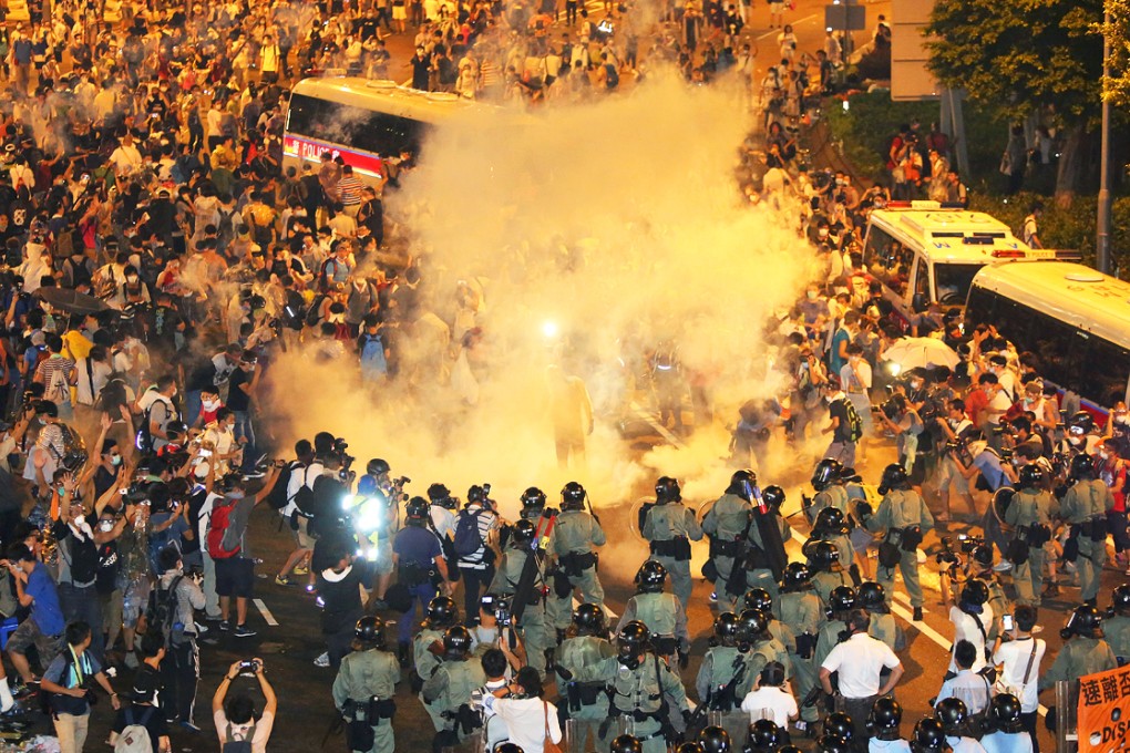 The police fire tear gas to protesters in Admiralty after "Occupy Central" was officially launched on September 28, 2014. Photo: Sam Tsang