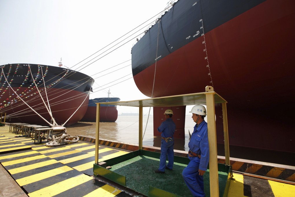 Very large ore carriers at a port in Jiangsu province, China. The country lifted a three-year old ban on Valemax dry bulk carriers docking in its ports. Photo: Reuters