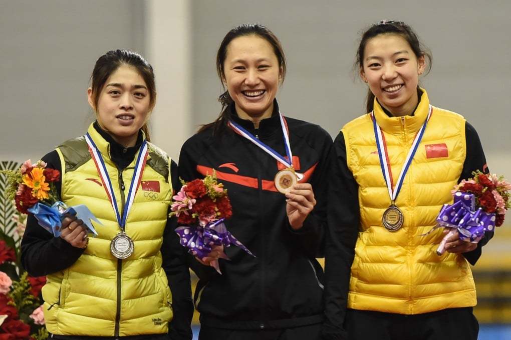 Chinese athletes pose with their medals after a sporting event last month. China will no longer use medal rankings to determine major awards for the biggest contributions at the Olympics and the Asian Games. Photo: Xinhua