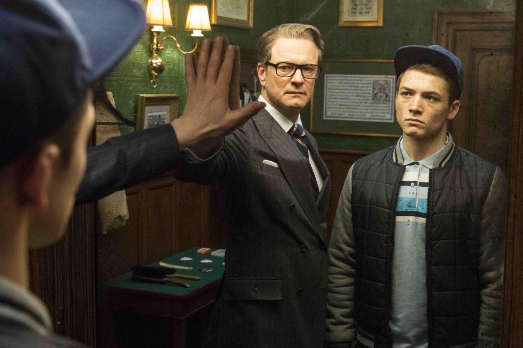 Colin Firth with Taron Egerton in a scene from Kingsman: The Secret Service.