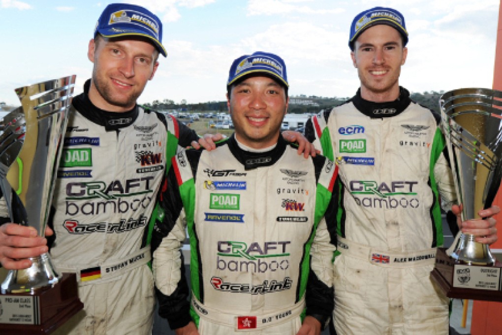 Hong Kong's Darryl O'Young is flanked by Germany's Stefan Mucke and Britain's Alex MacDowall after receiving their trophies at Bathurst. Photo: SCMP Pictures