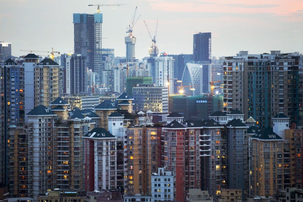 Commercial and residential buildings stand in the Nanshan district of Shenzhen. The government hoped to contain urban unemployment to 3.5 per cent this year, worse than last year's 2.44 per cent, as the economy continued to slow. Photo: Bloomberg