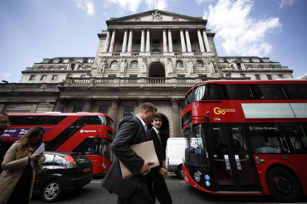 BOE revised up its growth forecasts and predicted wages would grow faster, suggesting voters may benefit from Britain's economic rebound before May 7 polls. Photo: Bloomberg