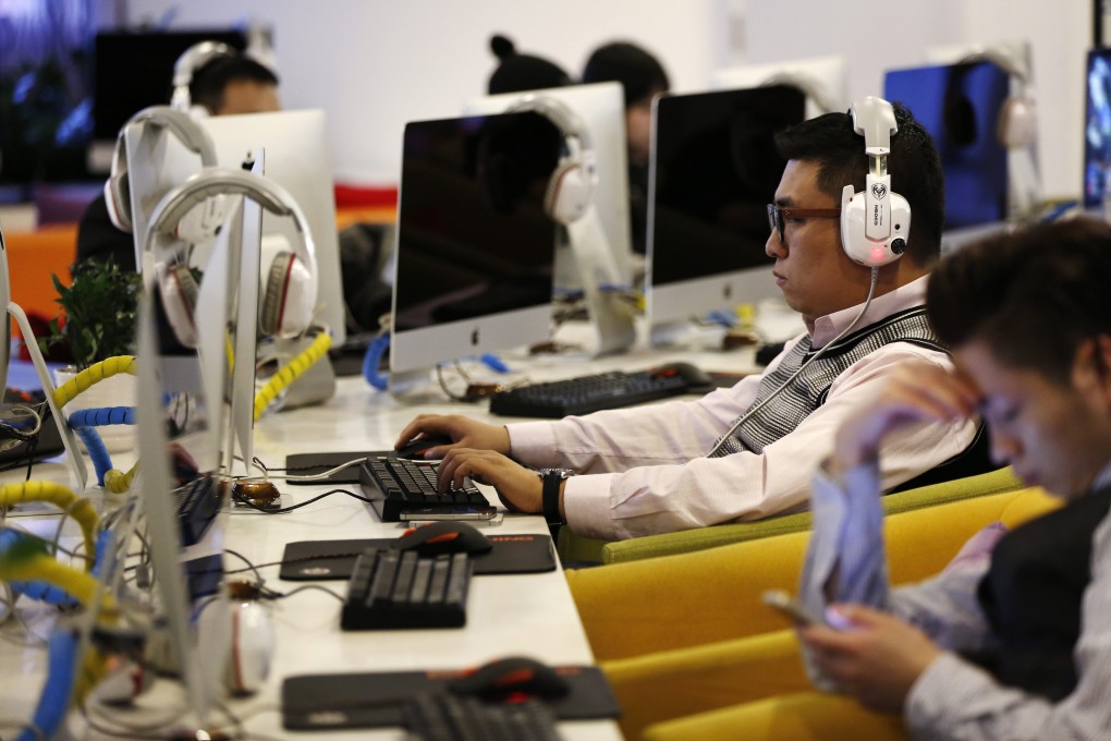 An internet cafe in Beijing, where restrictions on access to the internet could harm business. Photo: EPA