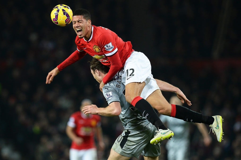 Chris Smalling goes up for a header. Photo: EPA