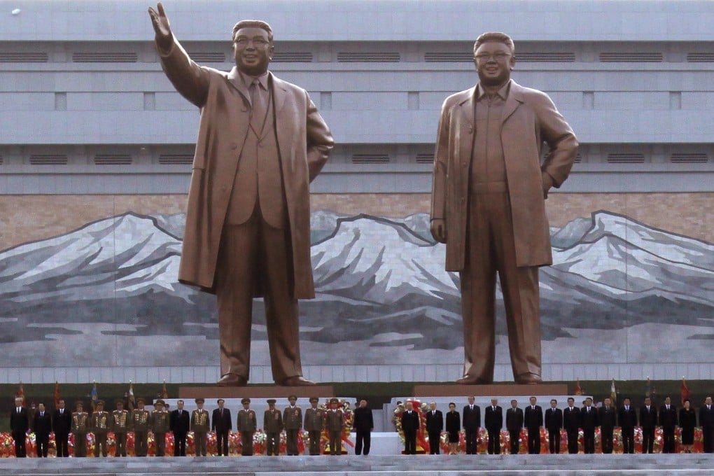 Many of the slogans hailed Kim Il-sung and Kim Jong-il, both of whom are honoured with statues in Pyongyang. Photo: Reuters