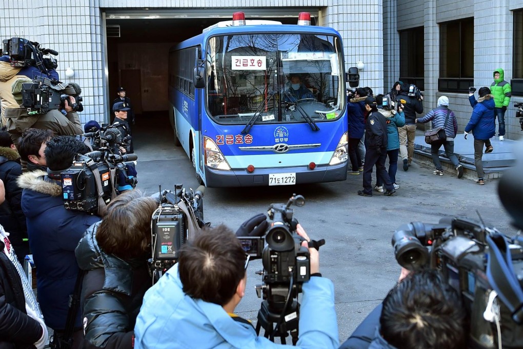 A prison bus carrying the Korean Air heiress arrives at court in Seoul yesterday prior to her sentencing to one year in prison for aviation safety violations. Photo: AFP