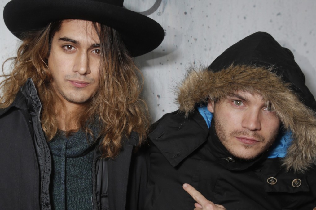 Emile Hirsch (right) and a friend pose outside Tao nightclub in Park City, Utah, on January 24. Hirsch is alleged to have attacked a woman in the club in the early hours of the next day. Photo: AP