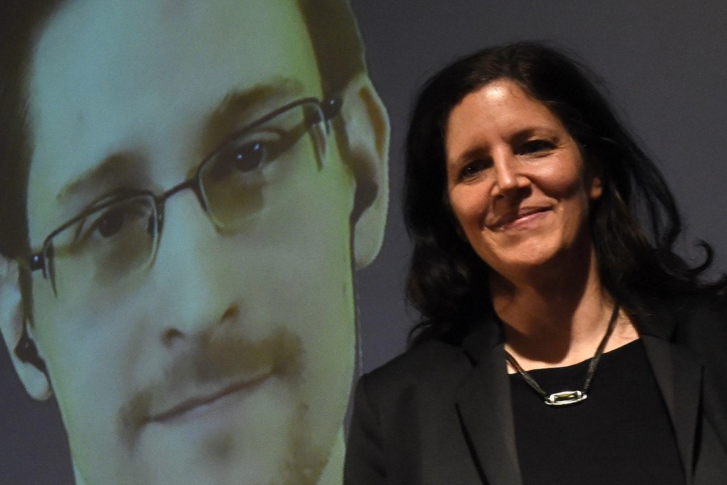 Edward Snowden and Laura Poitras appear in a video link. Photo: AFP