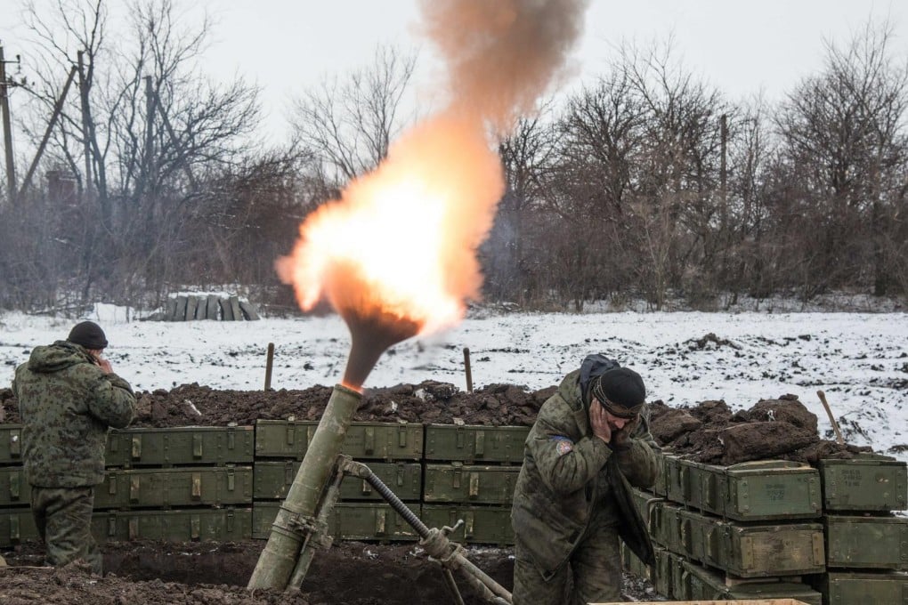 Ukrainian separatists fire a mortar at government troops last week ahead of a ceasefire set to take effect yesterday. Photo: AP