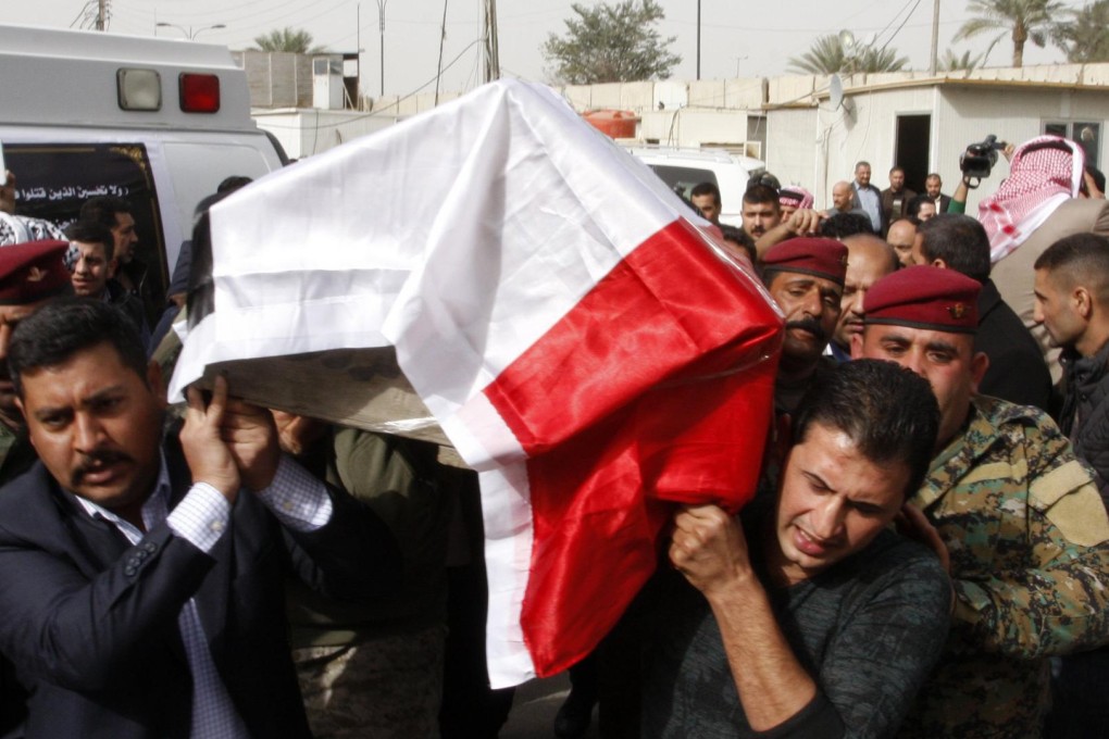 Mourners carry Sheikh Qasim al-Janabi's coffin. Photo: Reuters