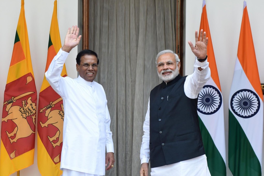 Maithripala Sirisena (left) and Narendra Modi in Delhi. Photo: AFP