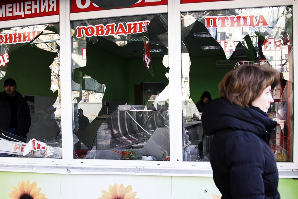 A grocery store shows the effects of earlier government shelling in the city of Donetsk in eastern Ukraine. Photo: Reuters