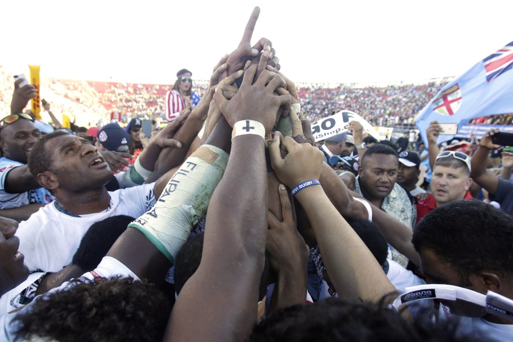 The Fiji players unite in celebrating their Las Vegas victory. Photo: AFP