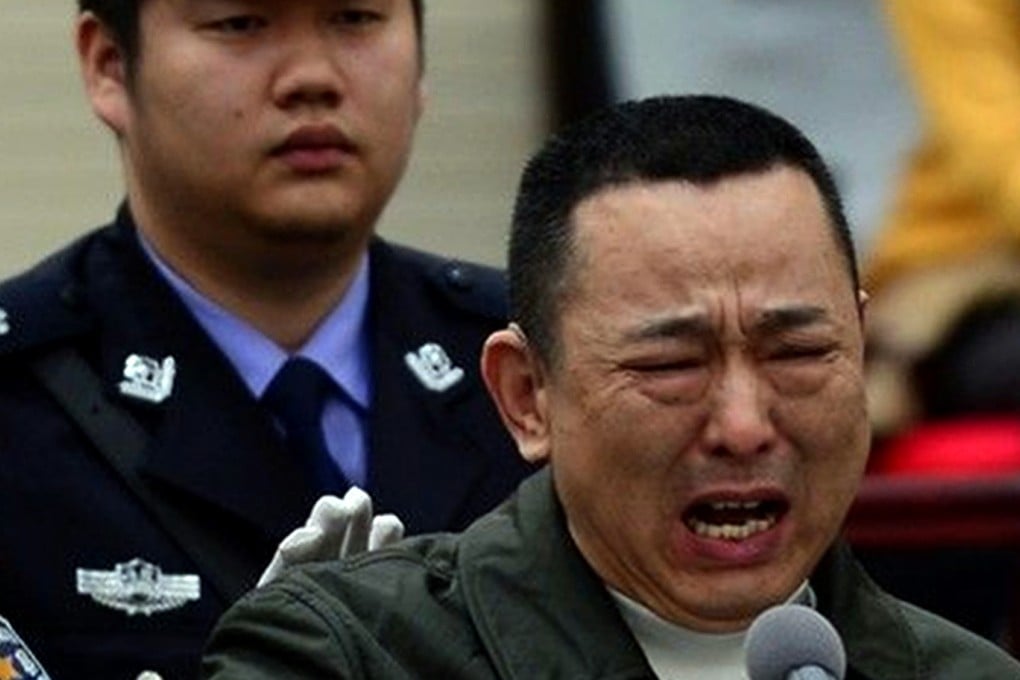 The look of despair on Liu Han's face revealed his pain as he heard the court's verdict. SCMP Pictures