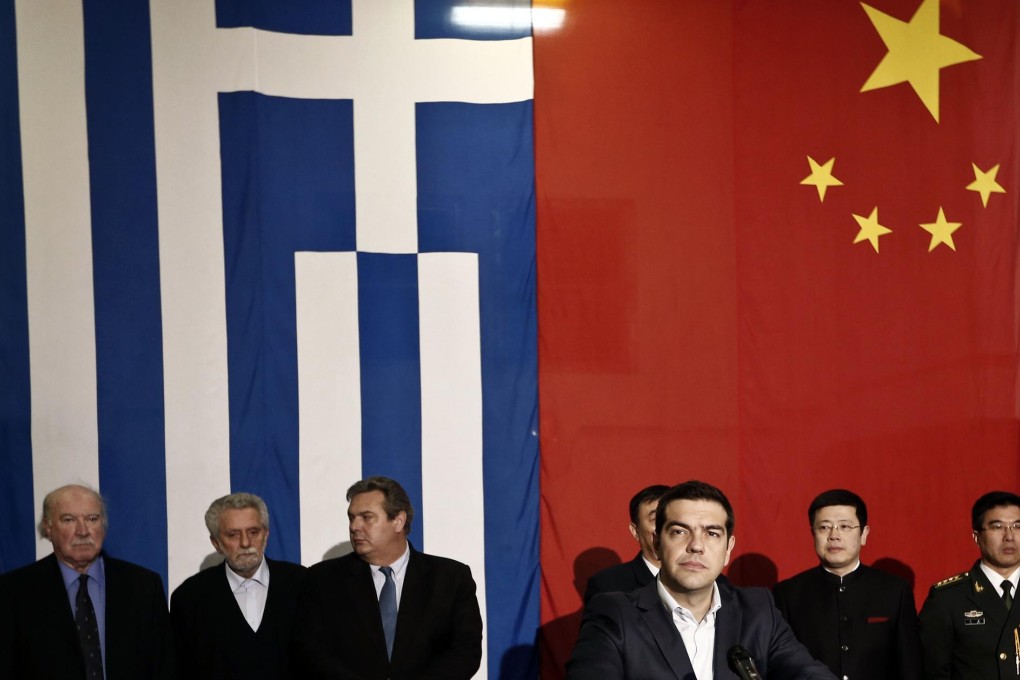 Greek Prime Minister Alexis Tsipras (third from right) on board the Chinese frigate Changbaishan at the port of Piraeus. Photo: Reuters