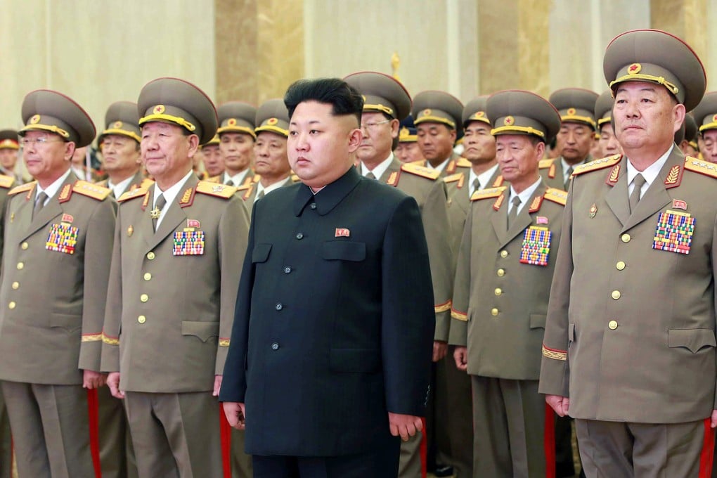 North Korean leader Kim Jong-un (centre) was reportedly informed of the UN panel's damning findings. Photo: Reuters
